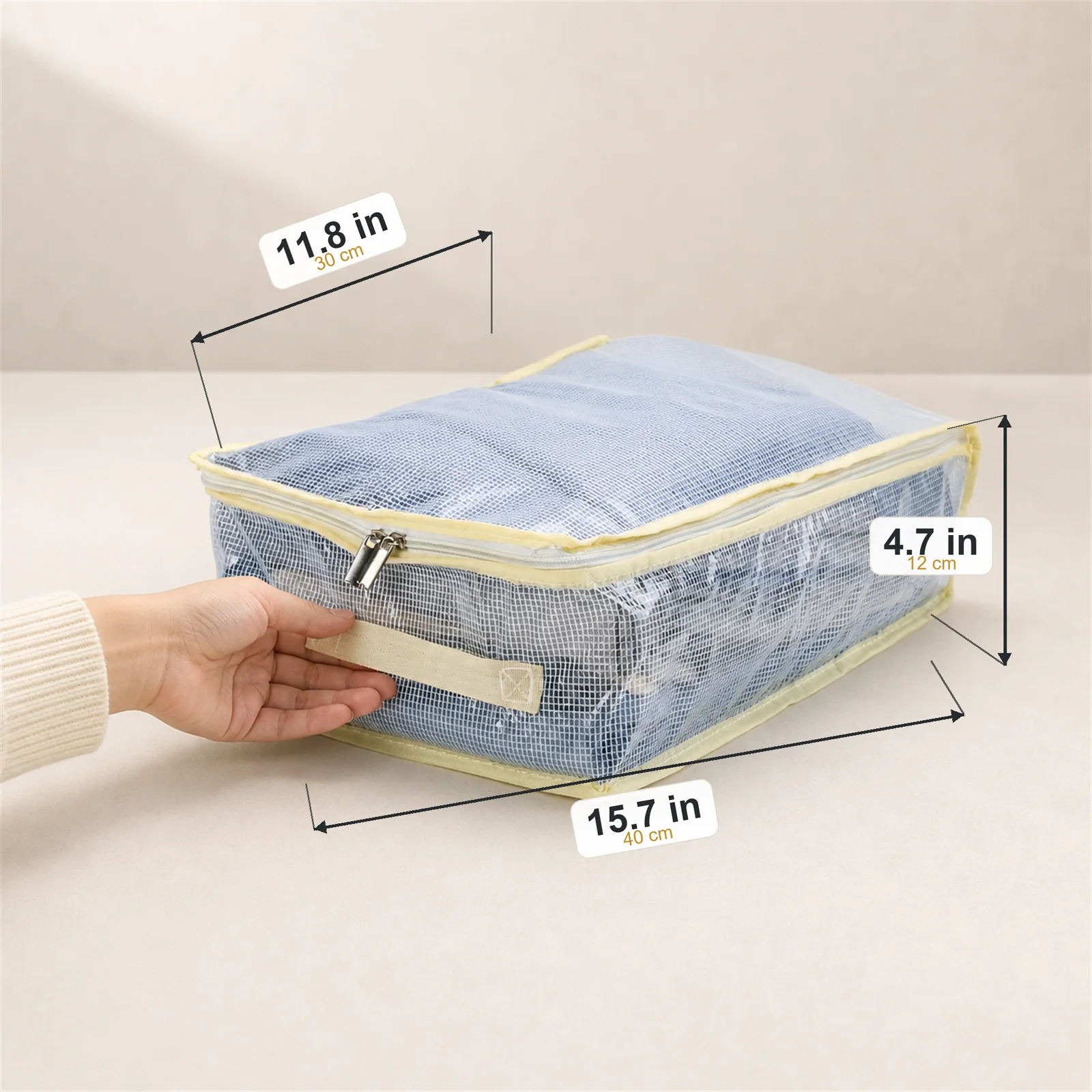 Bed sheet organizer dimensions 15.7 by 11.8 by 4.7 inches and 40 by 30 by 12 centimeters